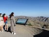 Visitors wear face masks at a lookout point in Joshua Tree National Park one day after the park reopened after being closed for two months due to the coronavirus pandemic on May 18, 2020 in Joshua Tree National Park, California. 
