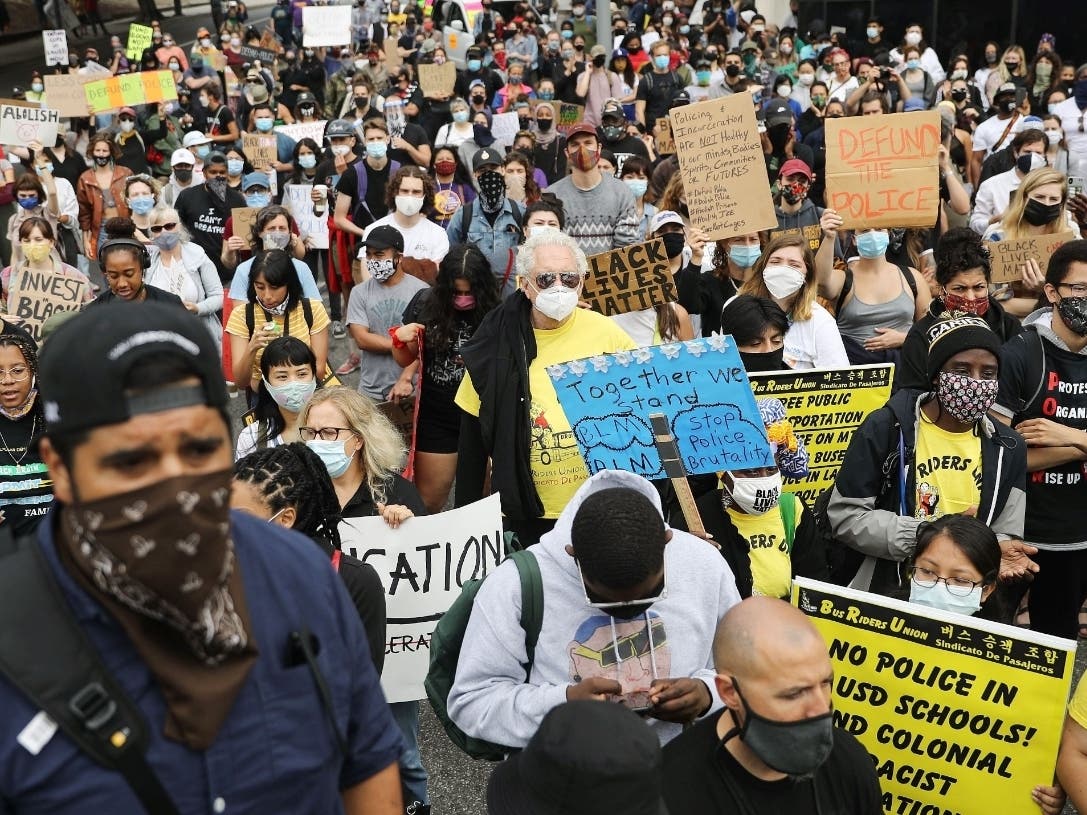 Black Lives Matter-Los Angeles supporters protest outside the Unified School District headquarters calling on the board of education to defund school police on June 23, 2020 in Los Angeles, California.
