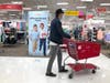 An advertisement for back-to-school uniforms is displayed at a Target store on August 03, 2020 in Colma, California. In the midst of the ongoing coronavirus pandemic, back-to-school shopping has mostly moved to online sales.