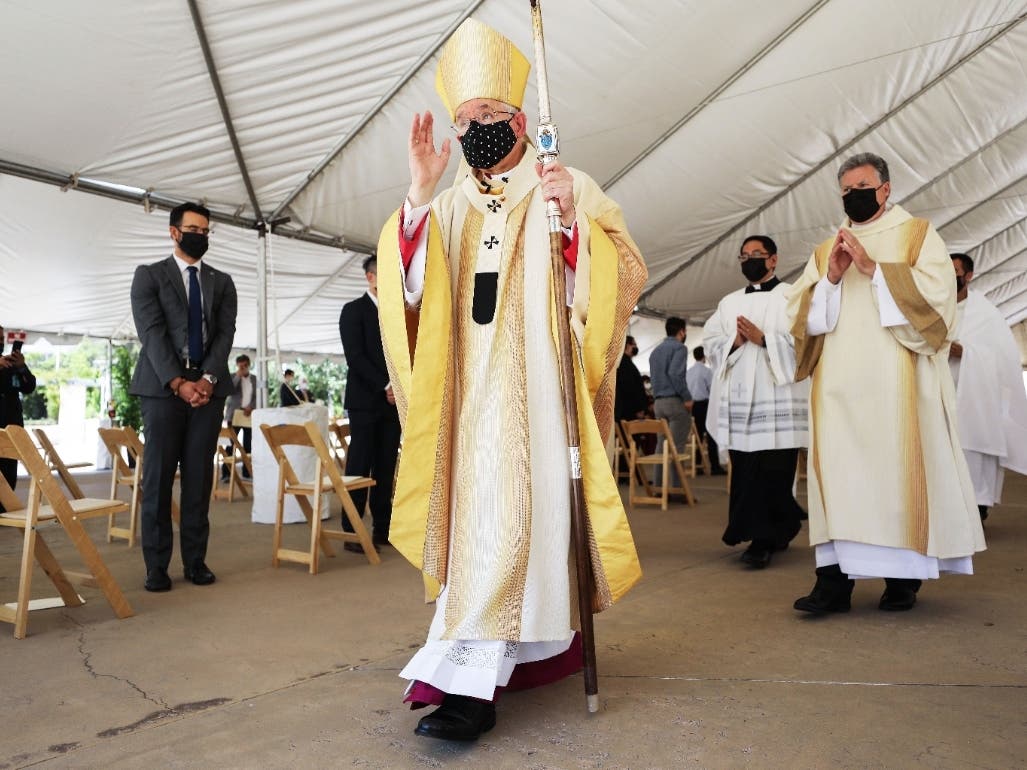 Archbishop José H. Gomez (C) departs the first-ever outdoor Ordination Mass at the Cathedral of Our Lady of the Angels amid the COVID-19 pandemic on August 8, 2020 in Los Angeles, California.