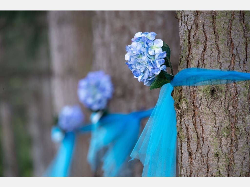 Decorative flowers adorn the trees outside the Life Care Center on March 14, 2020 in Kirkland, Wash.