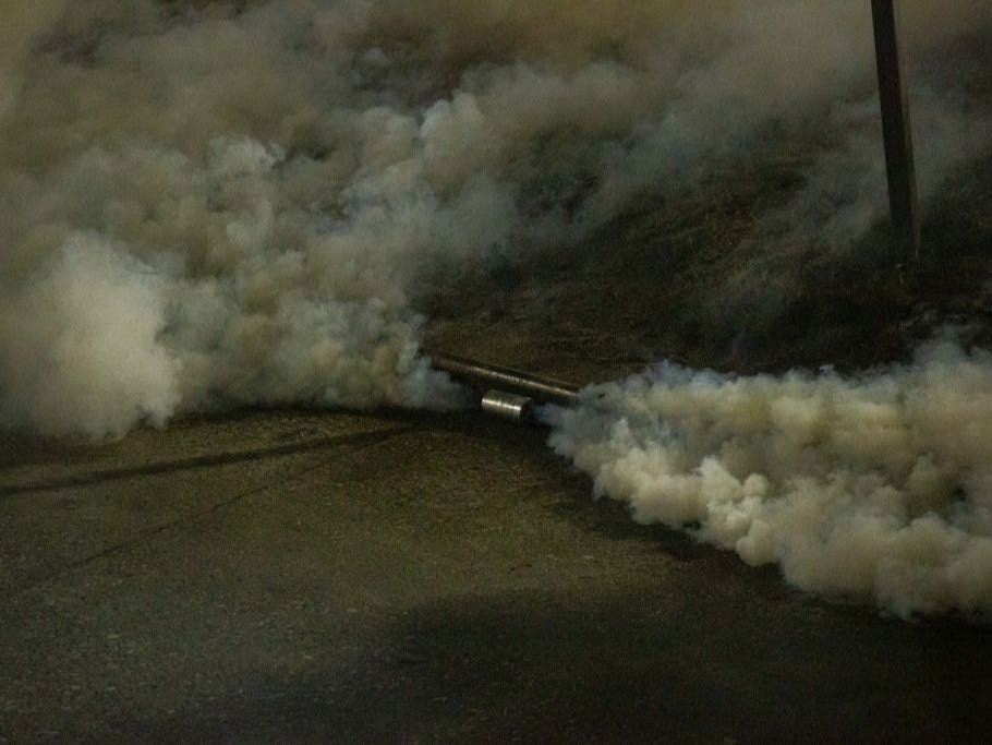  A gas canister deployed by police is seen as demonstrators clash with police near the Seattle Police Departments East Precinct shortly after midnight on June 8, 2020 in Seattle, Washington.