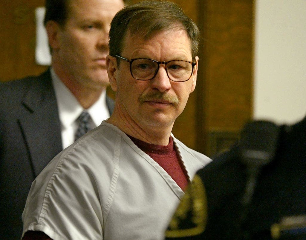 Gary Ridgway prepares to leave the courtroom where he was sentenced in King County Washington Superior Court on Dec. 18, 2003 in Seattle.