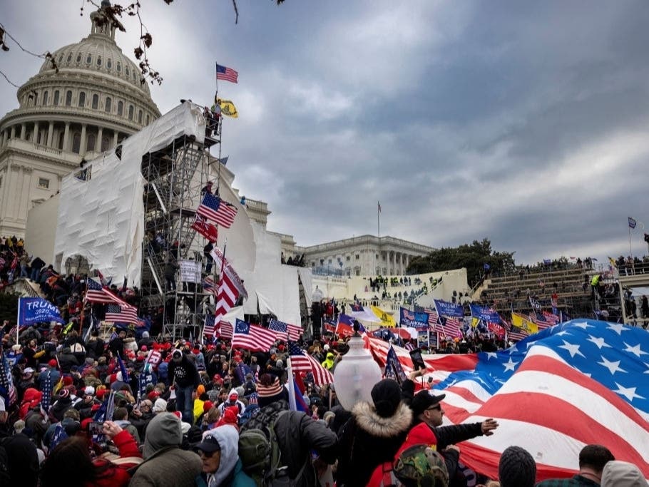 Trump supporters clash with police and security forces as people try to storm the US Capitol on January 6, 2021, in Washington, DC.