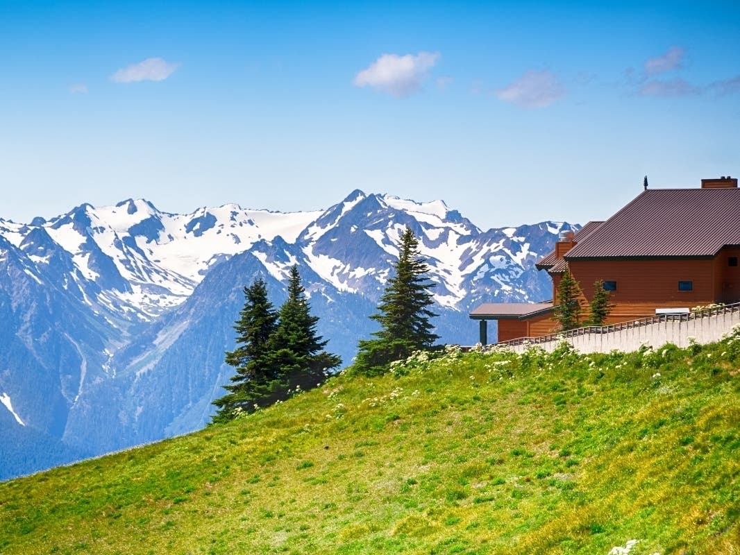 Hurricane Ridge and Deer Park remained closed Tuesday as a multi-agency search continued for a man believed to be armed and possibly experiencing mental distress. 