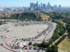 An aerial view of motorists lined up to be tested for COVID-19 in a parking lot at Dodger Stadium amid the coronavirus pandemic on July 10, 2020 in Los Angeles, California. 