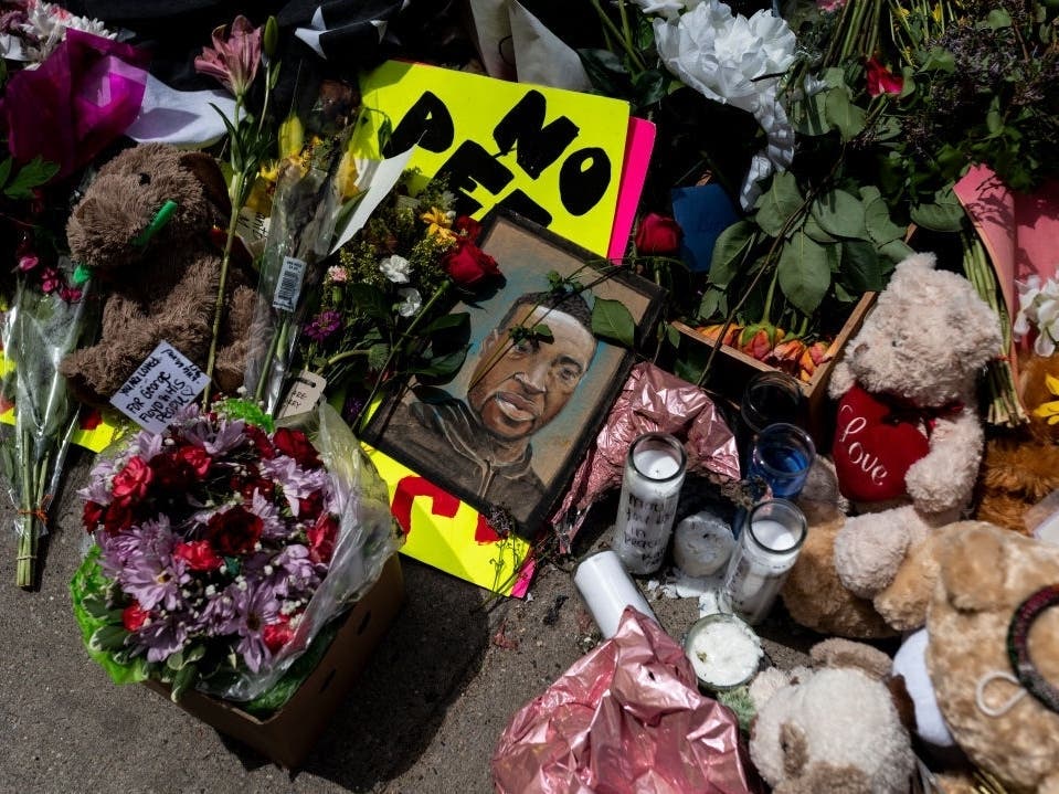 A memorial lies outside the Cup Foods, where George Floyd was killed in police custody, on May 28, in Minneapolis, Minnesota