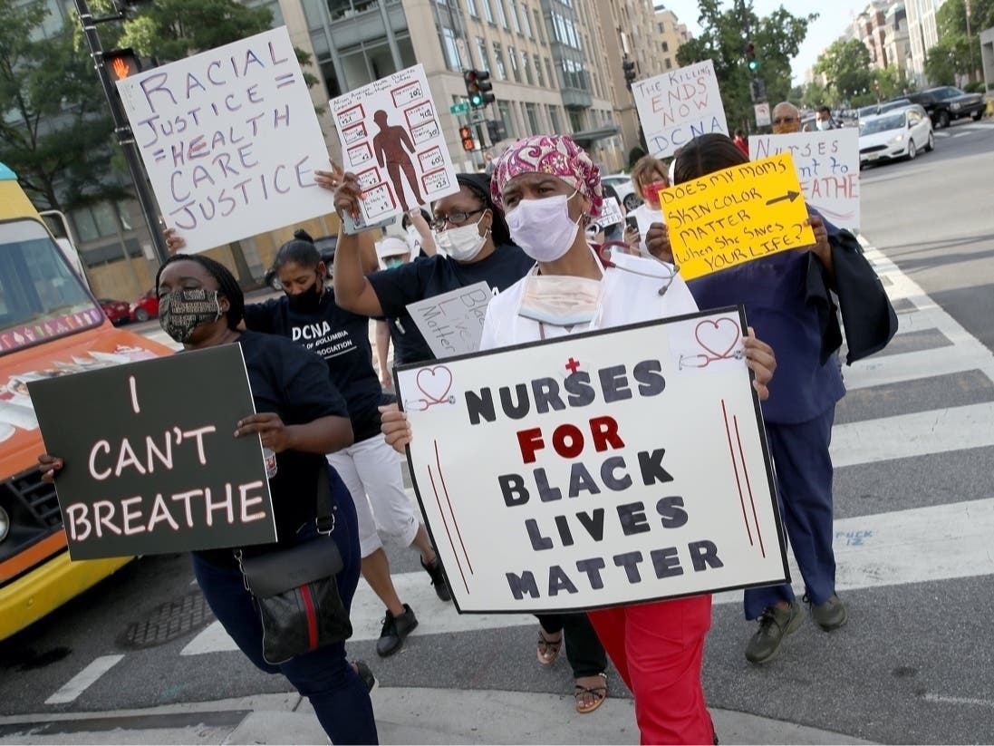 Medical workers from the DC Nurses Association march in support of Black Lives Matter June 11, in D.C.
