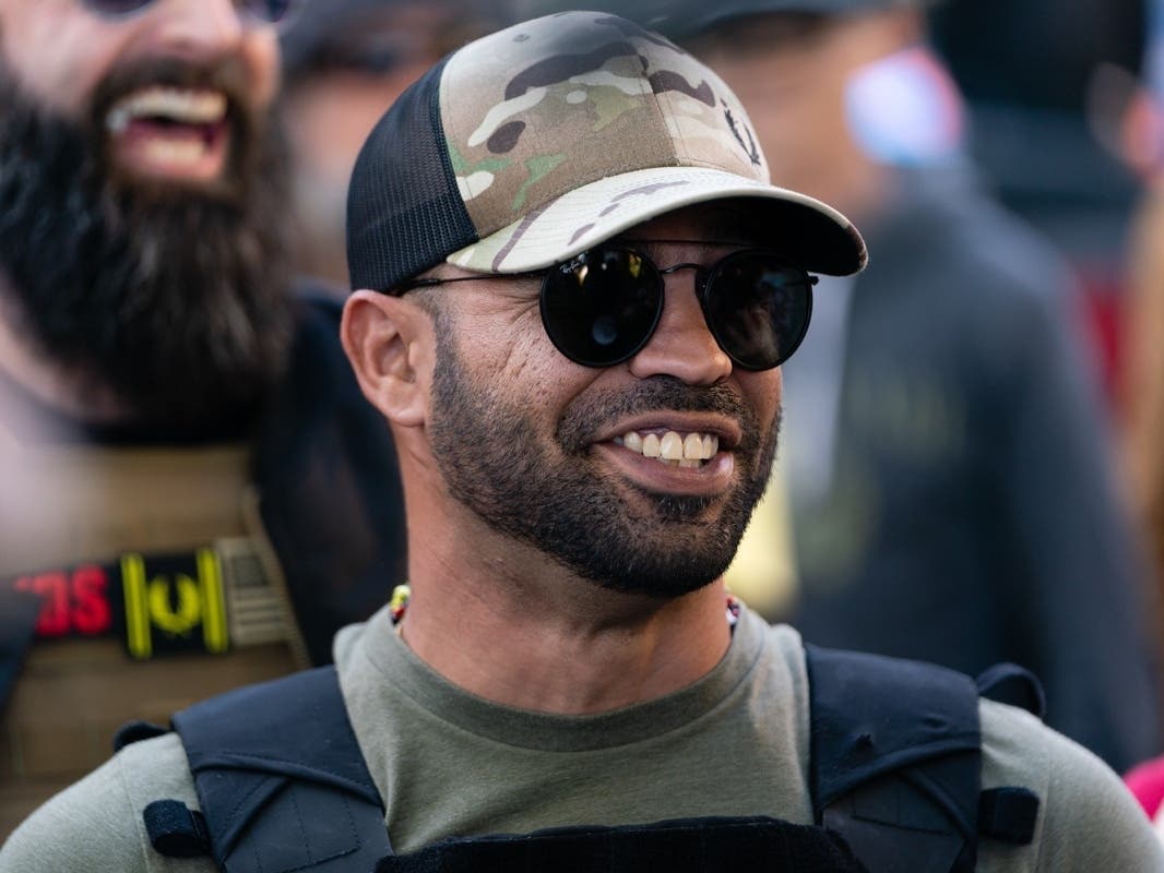  Enrique Tarrio, leader of the far-right Proud Boys group, is seen at a "Stop the Steal" rally Nov. 18 against the results of the U.S. presidential election outside the Georgia State Capitol in Atlanta.
