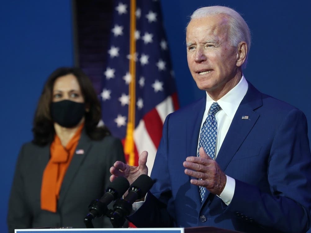 U.S. President-elect Joe Biden speaks to the media while flanked by Vice President-elect Kamala Harris, at the Queen Theater after receiving a briefing from the transition COVID-19 advisory board on Nov. 9, 2020 in Wilmington, Delaware.