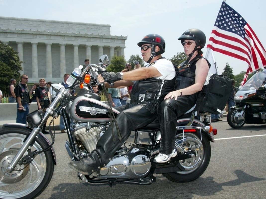 Bikers ride past the Lincoln Memorial during the annual Rolling Thunder motorcycle rally May 26, 2002 in Washington, D.C.