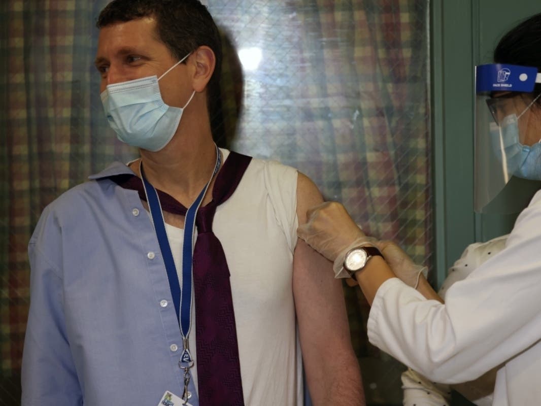 Dr. Jeffrey Farber, of the New Jewish Home in Manhattan, receives the Pfizer-BioNTech COVID-19 vaccine on Dec. 21.