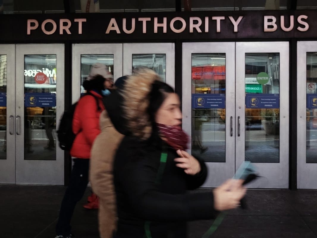 People walk by the Port Authority Bus Terminal in Manhattan on Jan. 26.