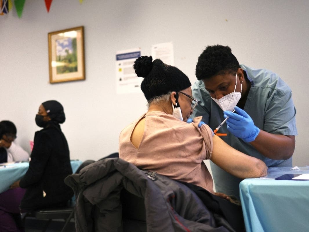 Elizabeth Griffin, 86, is given her first dose of the Moderna coronavirus vaccine by Anya Harris at Red Hook Neighborhood Senior Center on Feb. 22.