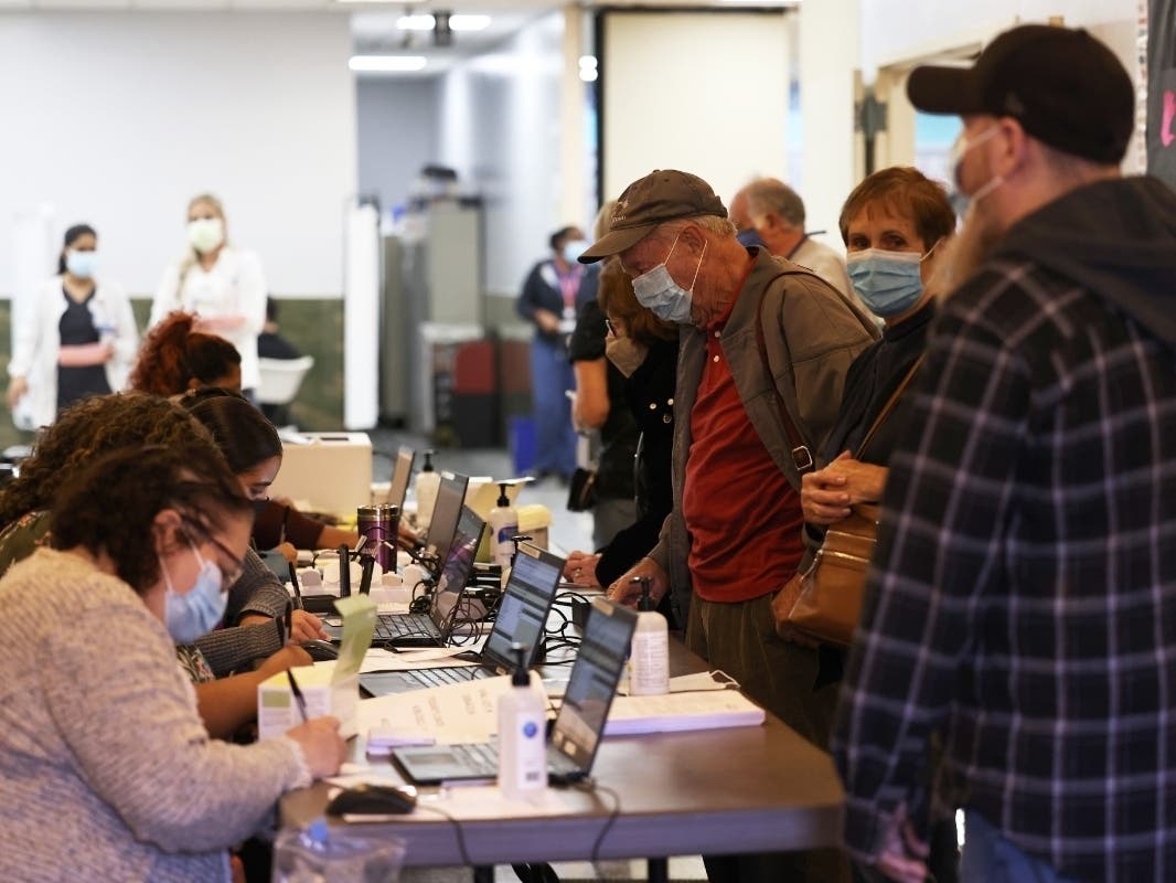 People are checked in at the Northwell Health pop-up coronavirus vaccination site at the Albanian Islamic Cultural Center in Staten Island on Thursday.