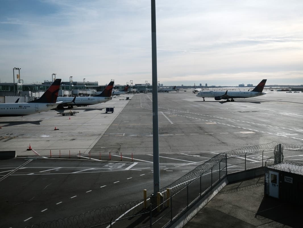 A plane sits on a tarmac at an international terminal at John F. Kennedy Airport on Jan. 25.