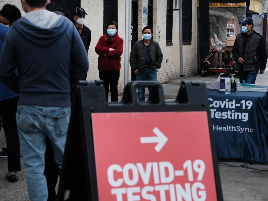 People register to receive the COVID-19 vaccination in Sunset Park on April 7.