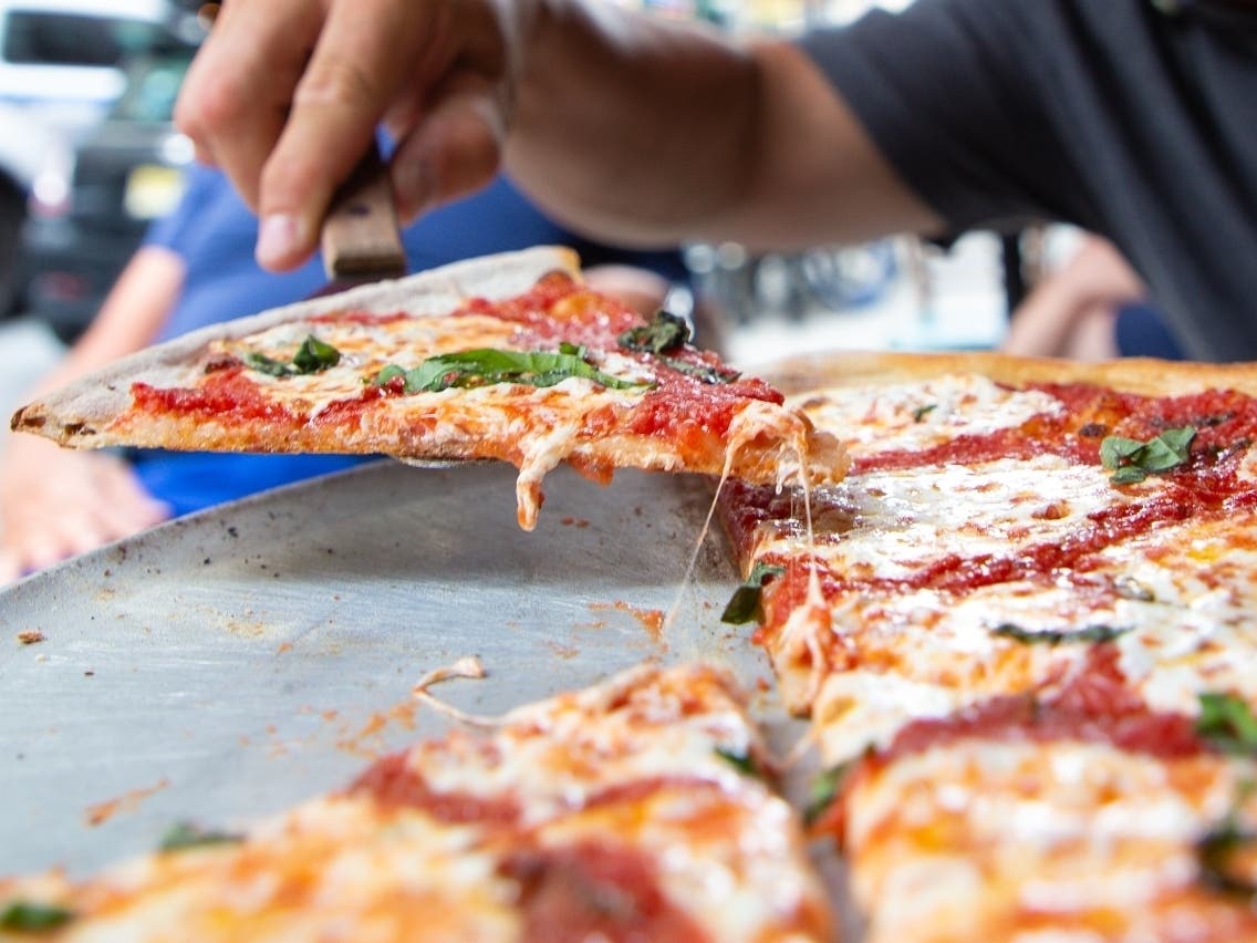 A Margherita pie is seen served at the famous Lombardi's Pizza amid the COVID-19 pandemic on July 7.
