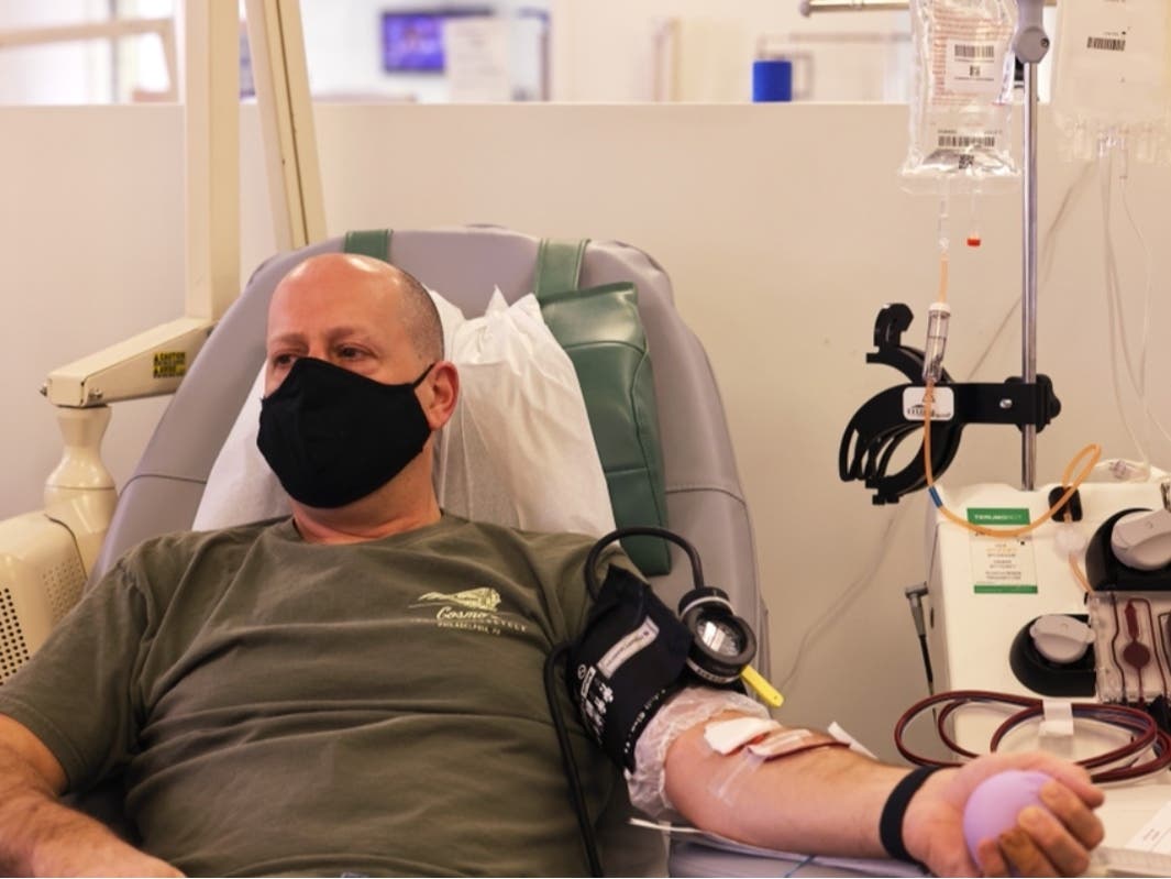 Peter Yaverbaum donates blood at a New York Blood Center in the Upper East Side neighborhood of Manhattan on Dec. 2.