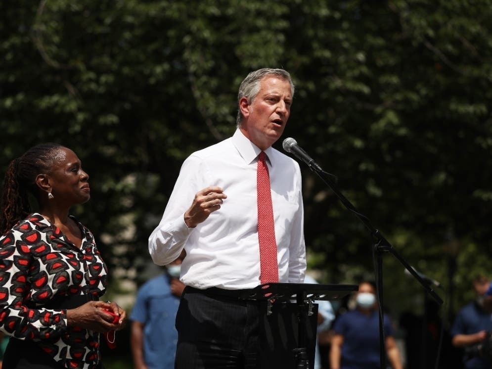 Mayor Bill de Blasio speaks to an estimated 10,000 people as they gather in Brooklyn’s Cadman Plaza Park on June 4, 2020 for a memorial service for George Floyd.