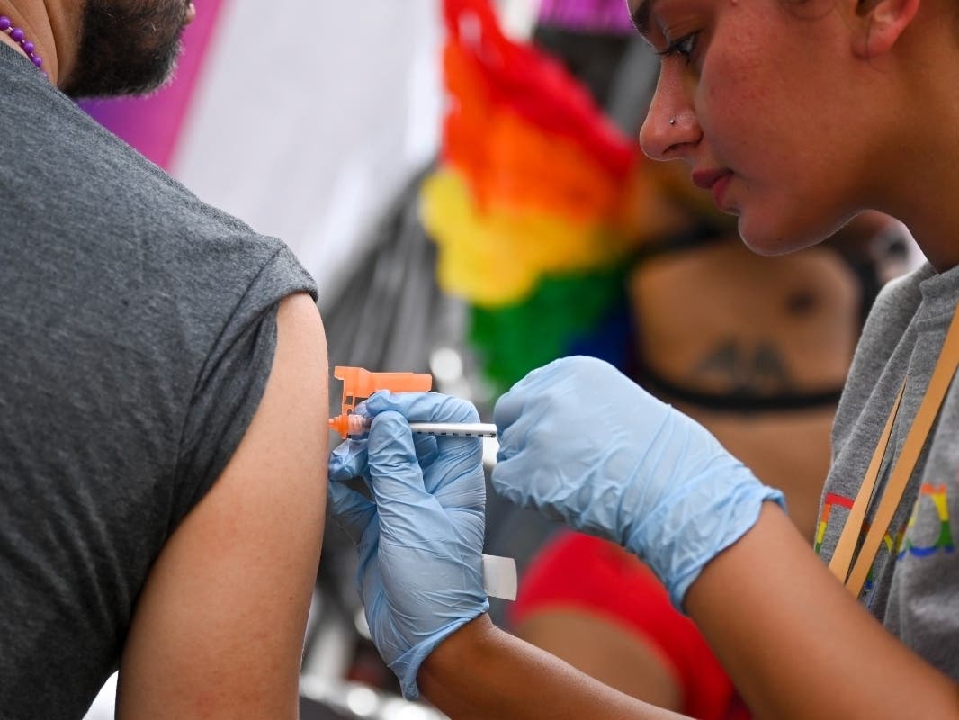 A person receives a COVID-19 vaccination at the 2021 NYC Pride Fest near Union Square on June 27.