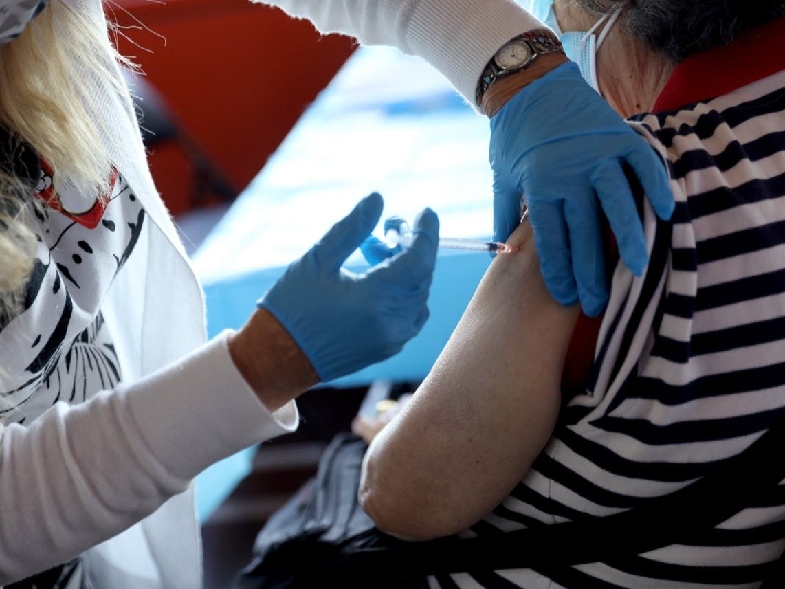 A healthcare worker administers the vaccine as the Empire State Building Offers COVID-19 Vaccines at its Observatory on June 18.
