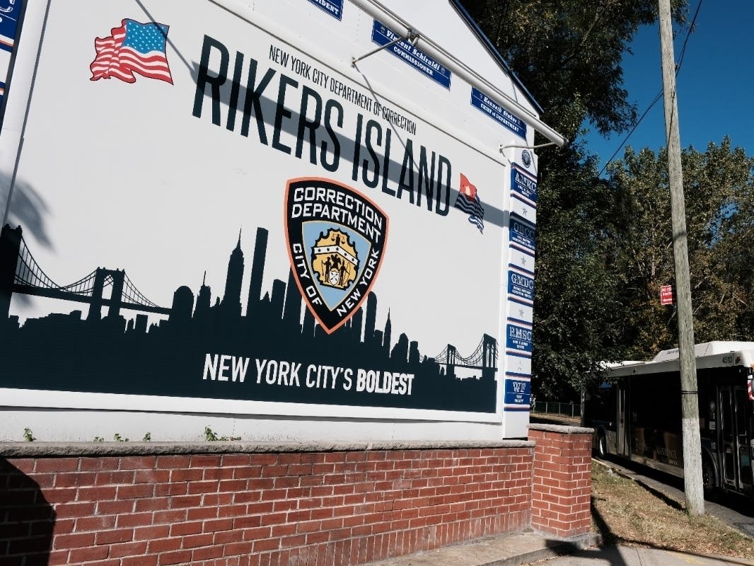 The entrance to Rikers Island, home to the main jail complex, is shown from Queens on Oct. 19.
