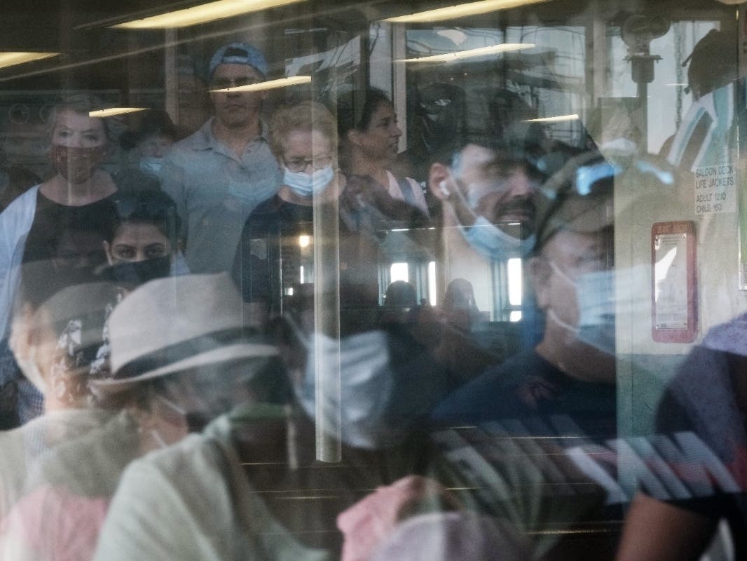 A city-operated mobile pharmacy advertises the COVID-19 vaccine in Brooklyn on July 30.