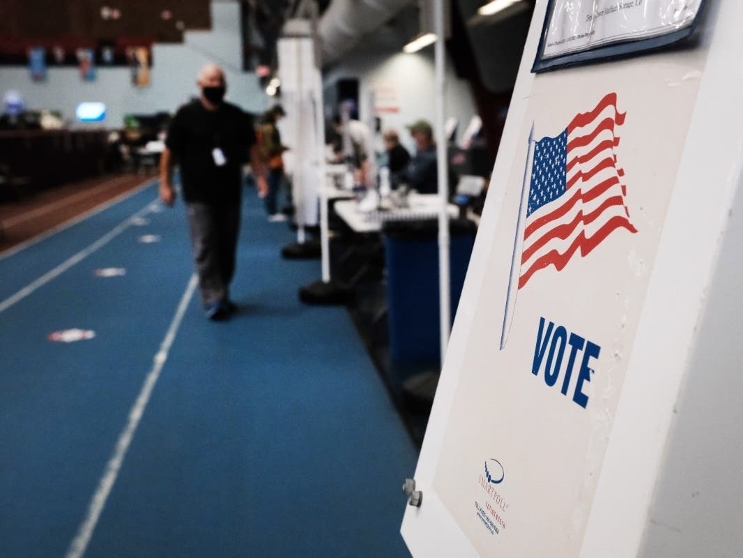 People visit a voting site at a YMCA on Nov. 2.