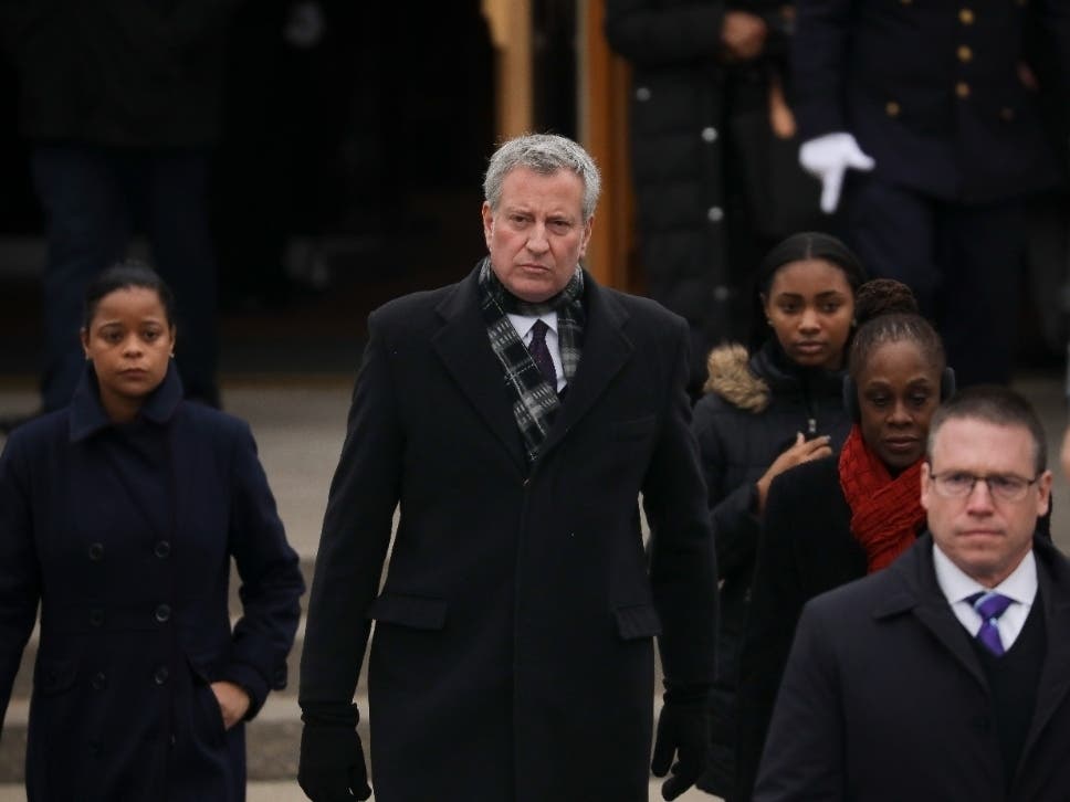 Mayor Bill de Blasio exits a church following the funeral service of fallen NYPD Detective Brian Simonsen at the Church of St. Rosalie on Feb. 20, 2019 in Hampton Bays.