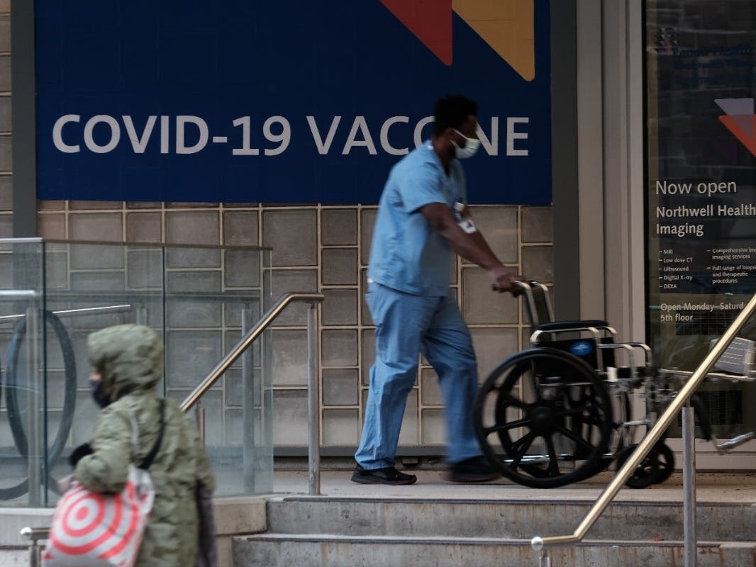 A sign outside of a New York City hospital advertises the COVID-19 vaccine on Nov. 19.