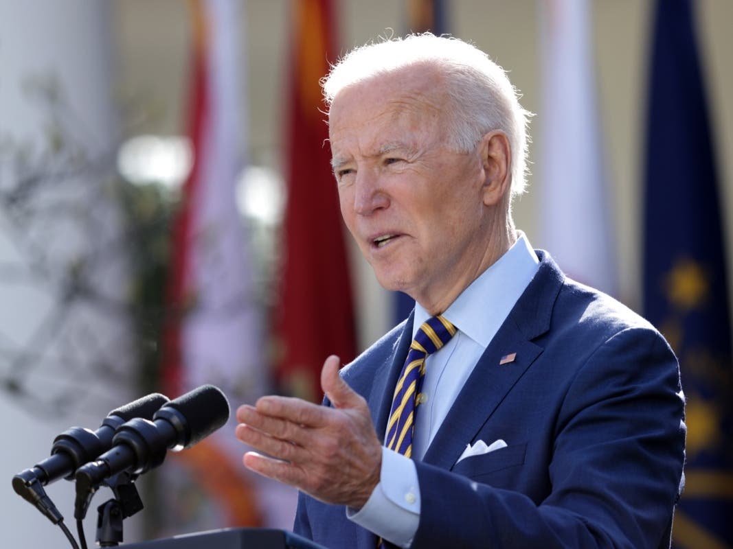 President Joe Biden signs the $1.9 trillion American Rescue Plan March 11 in the Oval Office. It included $122 billion for schools, with Illinois schools districts set to receive $7 billion.
