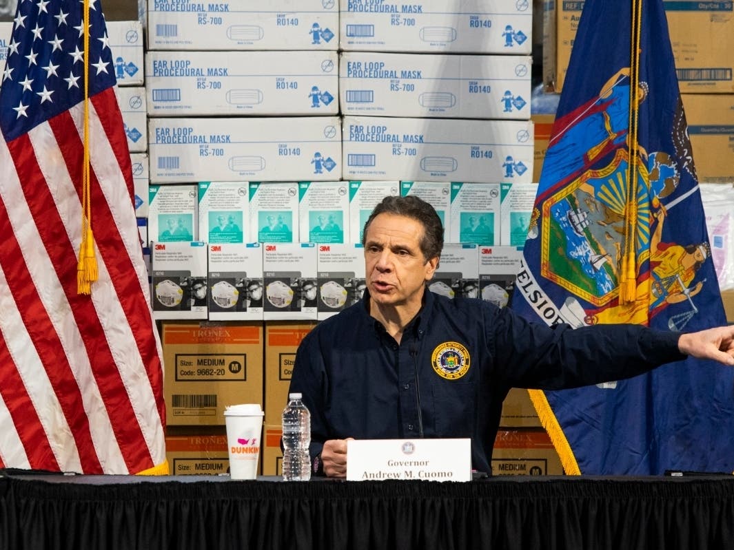  New York Governor Andrew Cuomo speaks to the media at the Javits Convention Center which is being turned into a hospital to help fight coronavirus cases on March 24, 2020 in New York City. 
