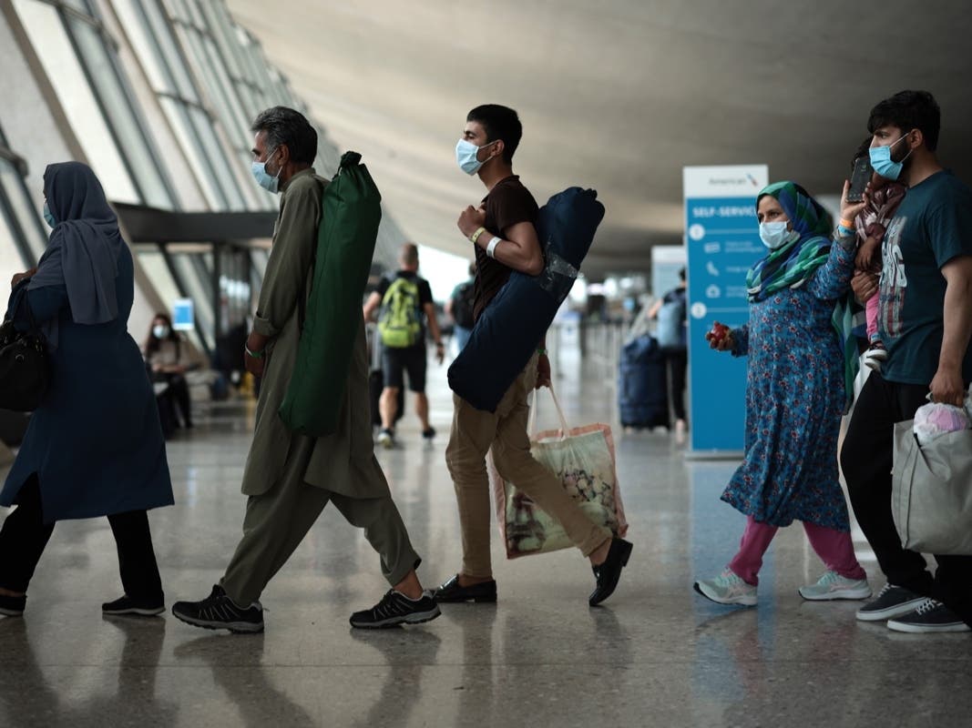 Afghan refugees arrives at Washington's Dulles Airport.