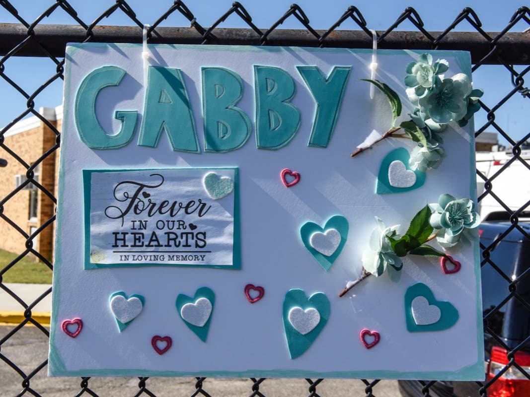 Hundreds gathered outside Gabby Petito's funeral in Holbrook, N.Y. on Sunday.