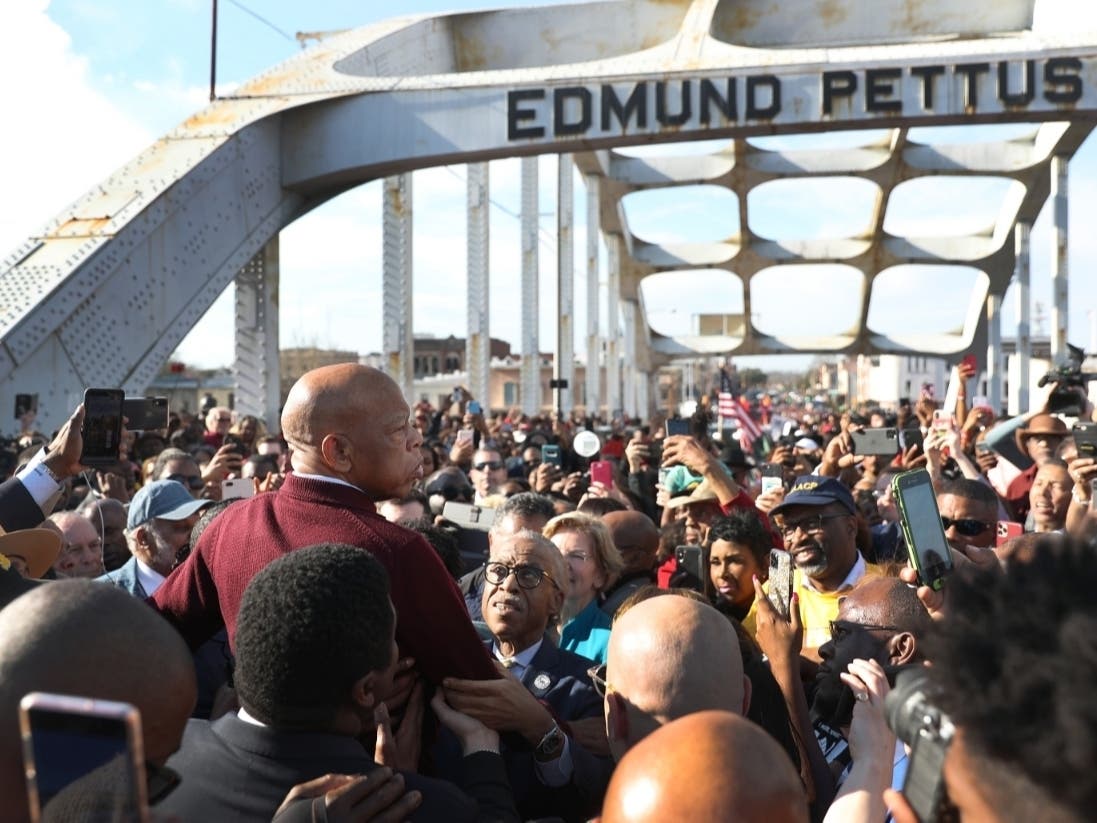 Rep. John Lewis (D-GA) speaks to the crowd at the Edmund Pettus Bridge crossing reenactment marking 55th anniversary of Selma's Bloody Sunday on March 1, 2020 in Selma, Alabama. Lewis marched for civil rights across the bridge 55 years ago.