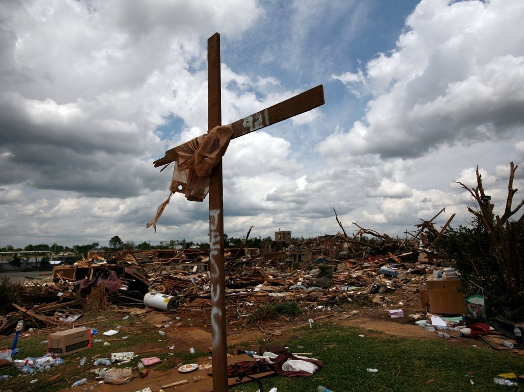 A cross stands over a destroyed neighborhood on May 2, 2011 in Tuscaloosa, Alabama after the tornado that hit on April 27. 