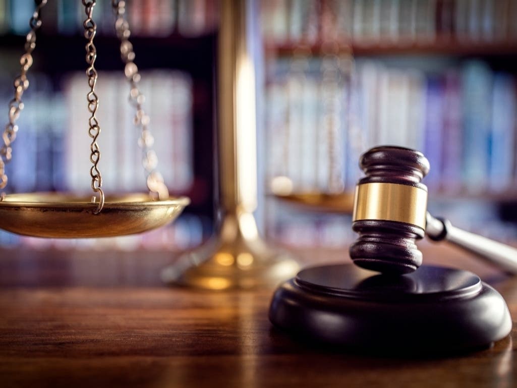 Gavel, scales of justice and law books