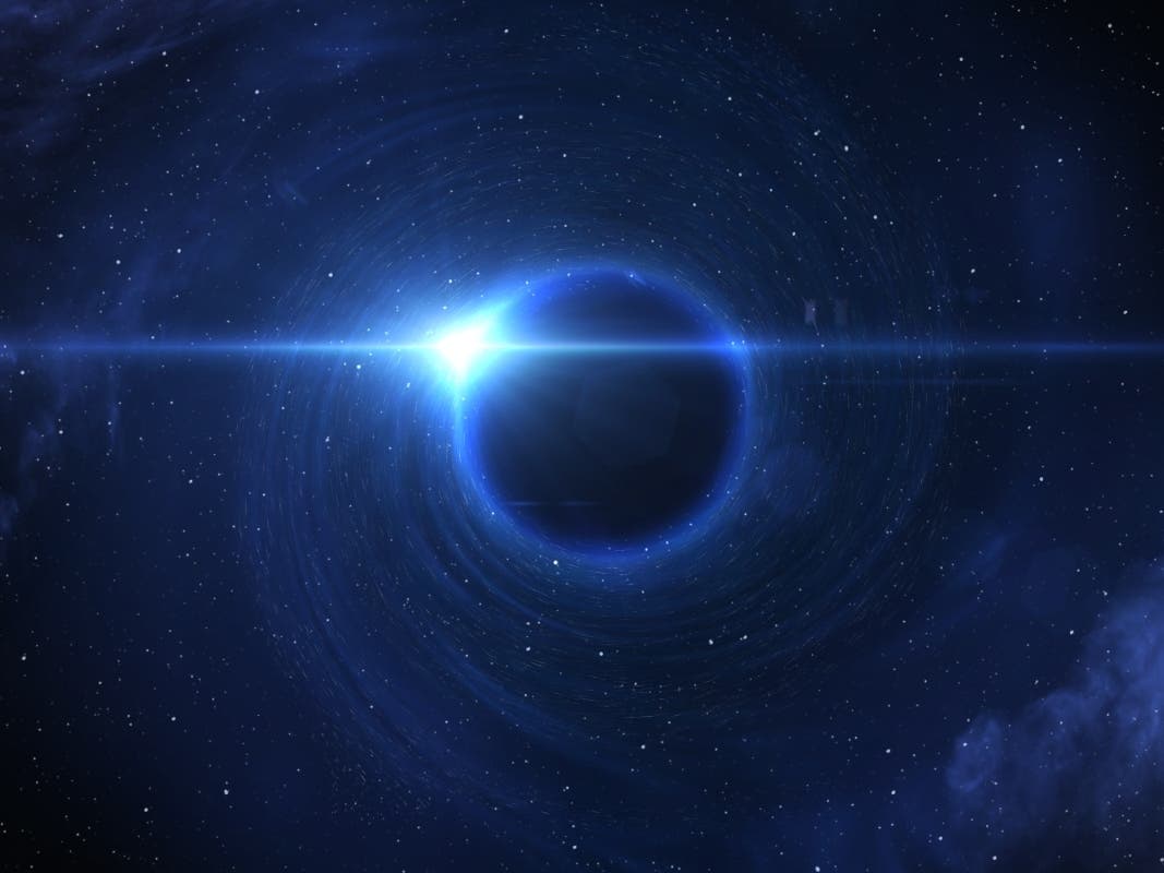 A rendering of a black hole devouring a star.