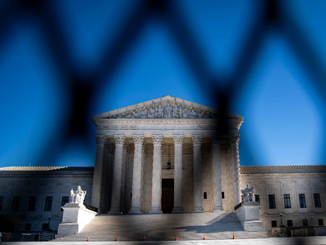 Protective fencing is erected around the U.S. Supreme Court, on January 10, 2021 in Washington, DC. 