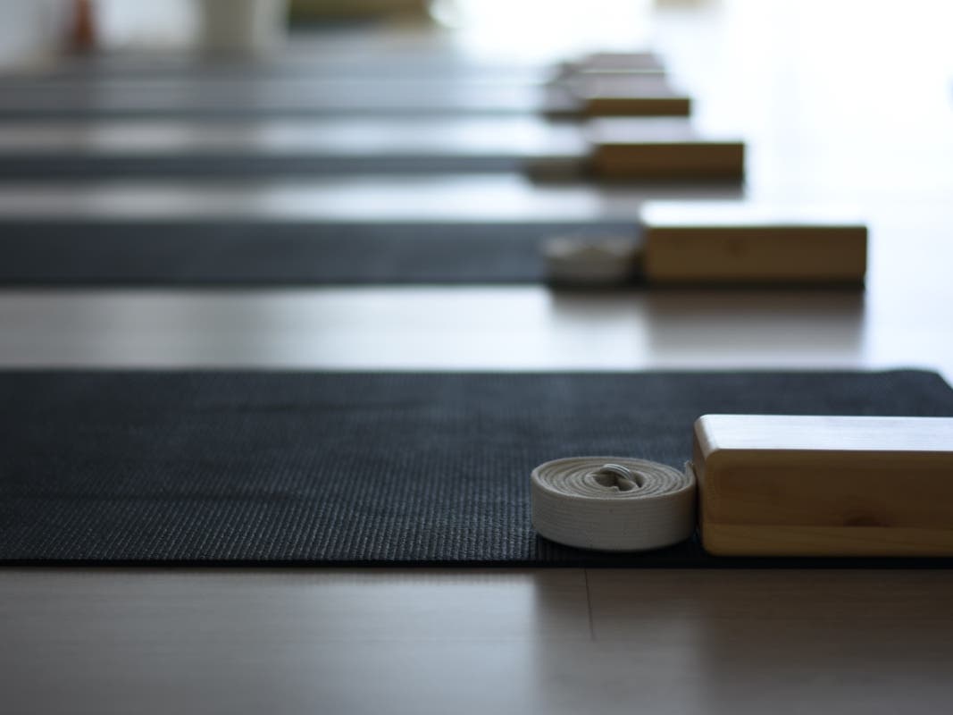 Pacifica Beach Yoga studio (not pictured here) has remained open on and off throughout the pandemic despite 80 written warnings from the county and a surge in coronavirus cases across the Bay Area. 