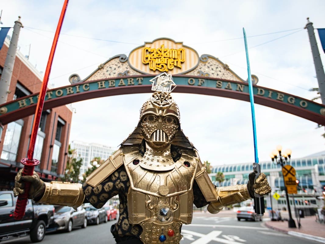 Cosplayer Christopher Canole, dressed as Dude Vader, poses in front of the Gaslamp Quarter sign on July 22, 2020 in San Diego, California. 
