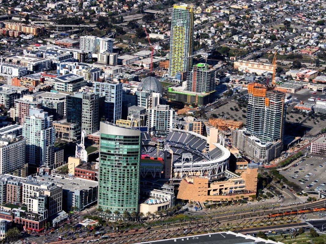 Police on Monday were investigating the deaths of a 40-year-old San Diego woman and her 2-year-old child. The mother and son fell to their death from Petco Park's third floor on Sunday in an accident that police described as "suspicious." 