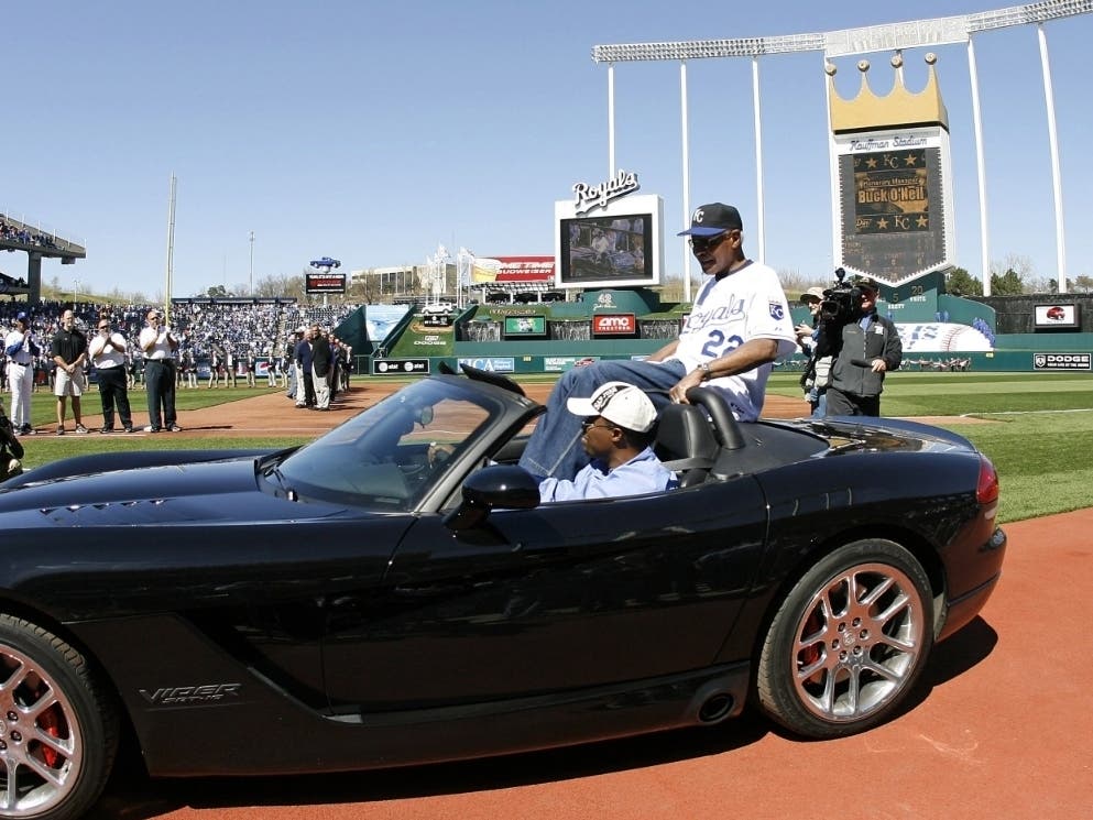 Former Kansas City Monarch and Sarasota native Buck O'Neil (#22) gets a ride during opening day festivities for the Kansas City Royals in 2006. A new exhibit at the Robert L. Taylor Community Complex showcases his illustrious baseball career.