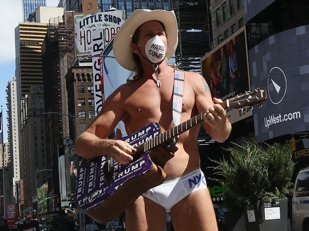 The Naked Cowboy performs in Times Square April 2 in the early days of the COVID-19 pandemic. He recently visited Siesta Key Beach in Sarasota after getting arrested during Daytona Beach’s Bike Week.