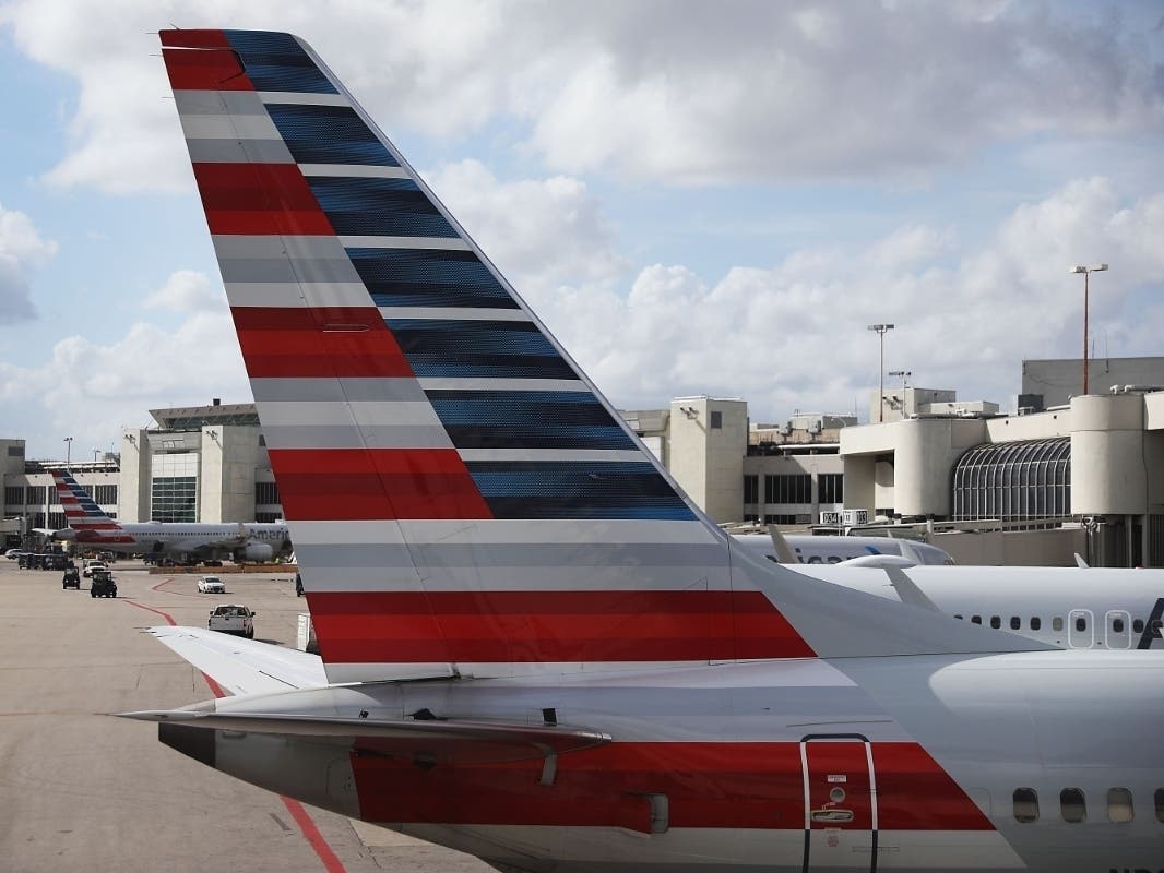 One person was arrested following a group fistfight in the American Airlines terminal at Miami International Airport, reports said.