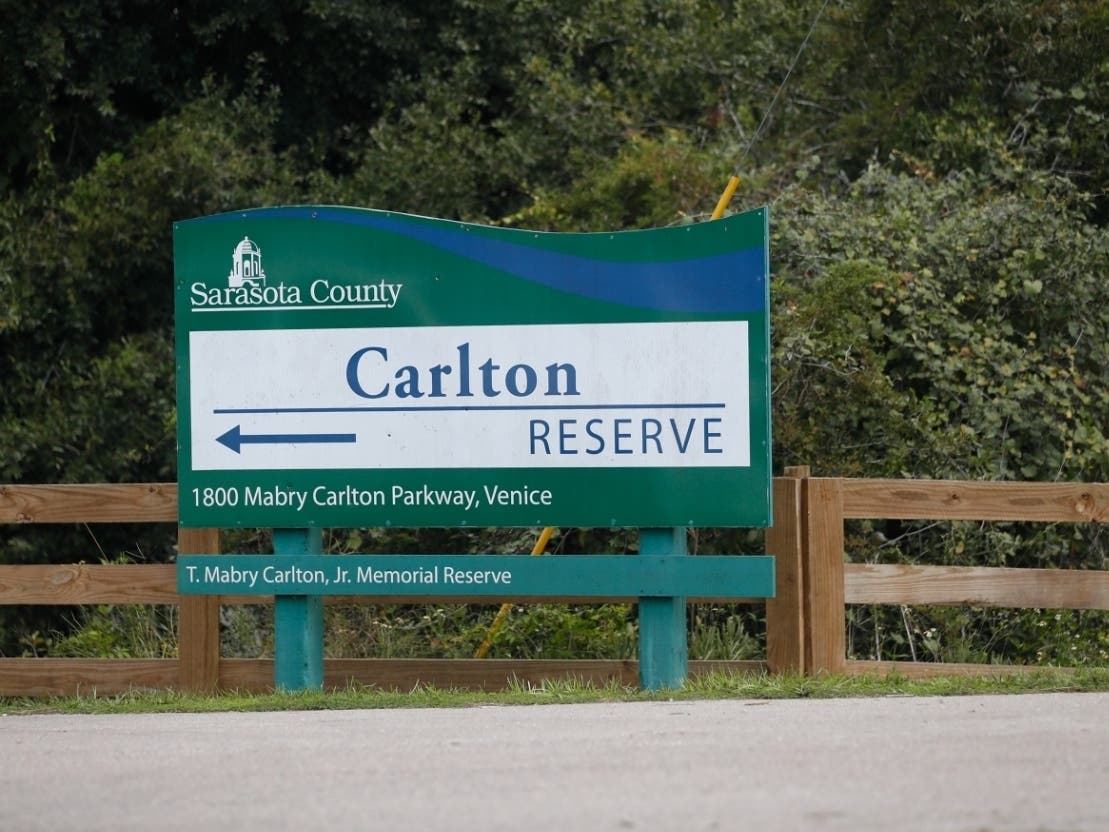 Authorities continue to search Sarasota County's Carlton Reserve for Brian Laundrie, a person of interest in the death of his fiancee, Gabby Petito. The remnants of a makeshift campsite were found there Wednesday.