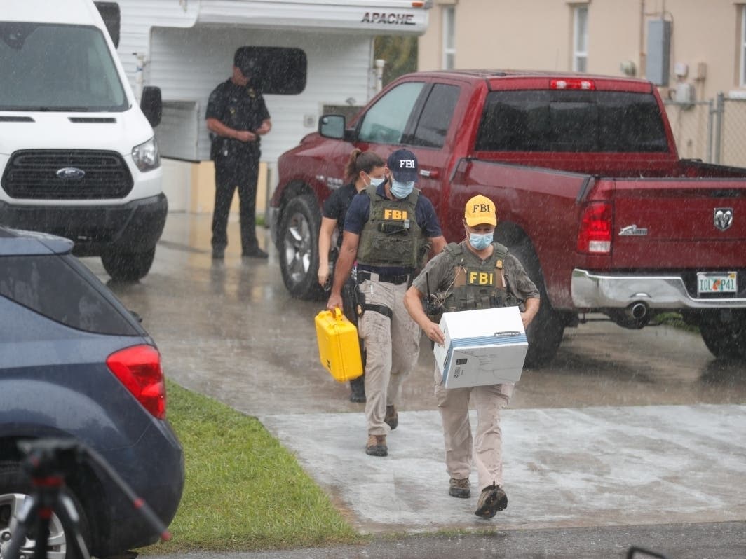 FBI agents remove evidence from the family home of Brian Laundrie, a person of interest in the death of Gabby Petito. Laundrie’s remains were found in Sarasota County Oct. 20. His attorney says the FBI has everything it needs to investigate his death.