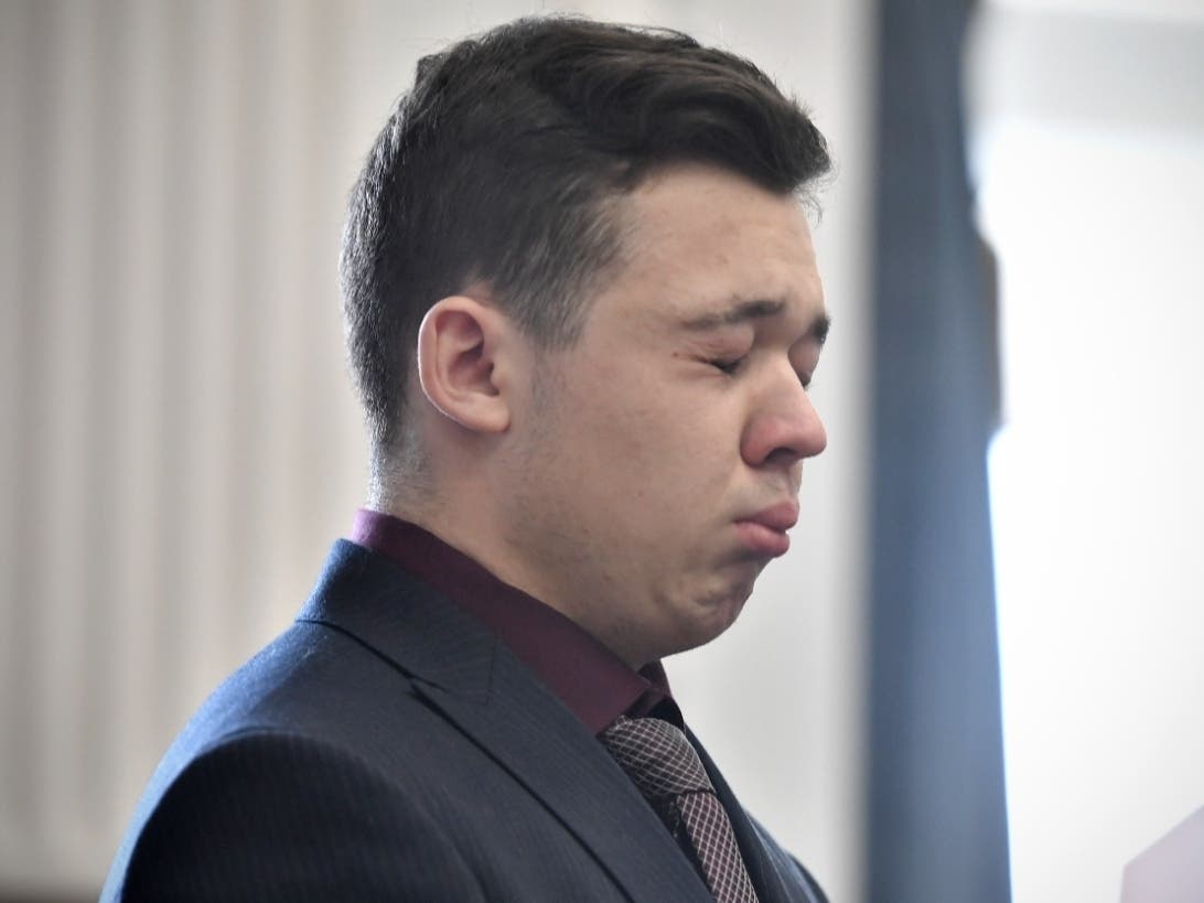 Kyle Rittenhouse cries as he is found not guilty on all counts at the Kenosha County Courthouse in Wisconsin Friday. He visited former President Donald Trump at Mar-a-Lago in South Florida after his acquittal.