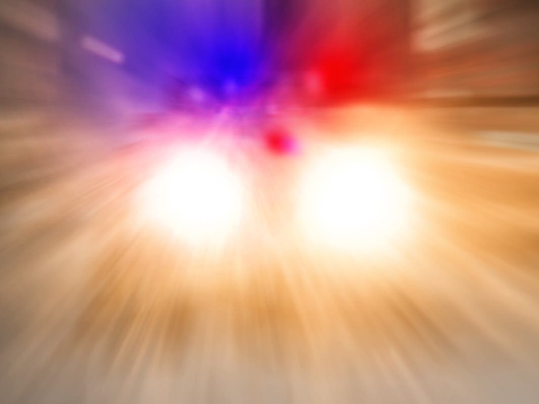 A file photo of a police car going on emergency call in the city street.